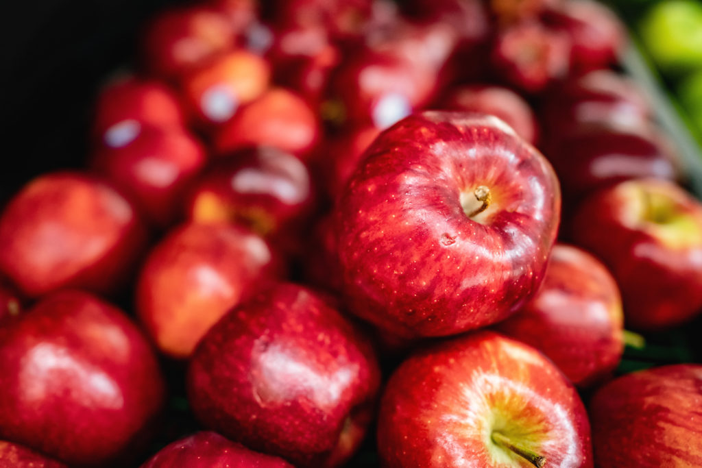 An image of a heap of red apples. 